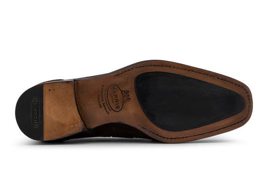 Mocasín con pompón en ante decolorado a mano