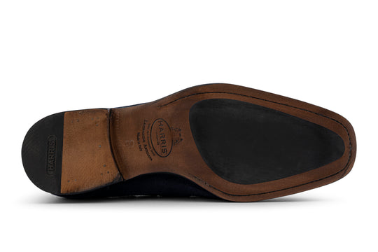 Mocasín con pompón en ante decolorado a mano