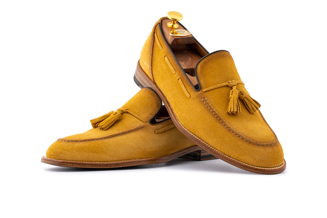 Mocassino in suede con pon pon