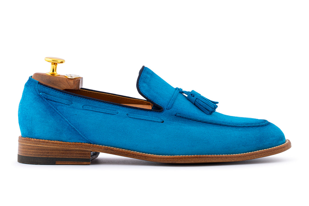 Mocassino in suede con pon pon