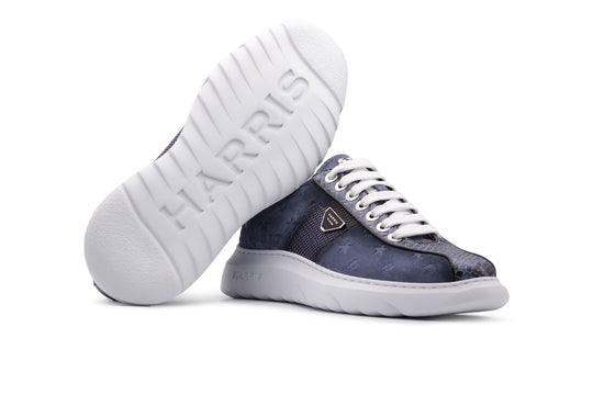 Sneakers in suede stampato e dettagli in pitone